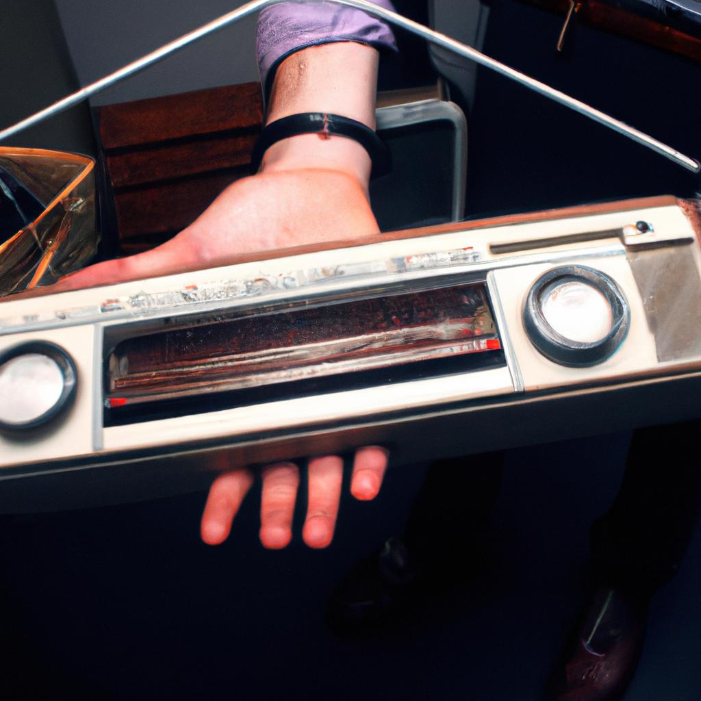 Person holding vintage radio equipment